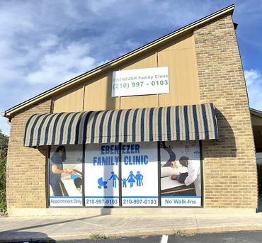 Ebenezer Family Clinic's welcoming exterior, featuring a clean, modern design with large windows and professional signage.