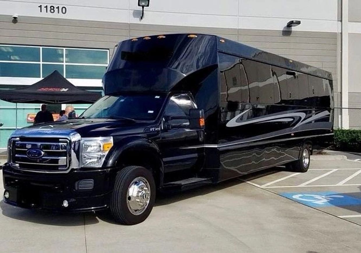 Black luxury 24 passenger party bus in Houston TX