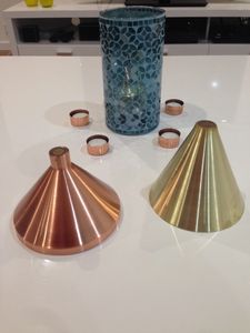 Metal spun Brass and copper light fittings and Candle table items