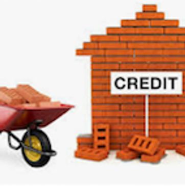 Barrel with bricks.  Brick house with the word "Credit" on it.
