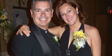 smiling couple-ballroom and latin dance teachers Theo and Ganine Derleth owners of Dancing Gardens