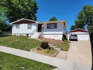 This lawn was overgrown, we fixed it up, weeded and cleaned up the yard
