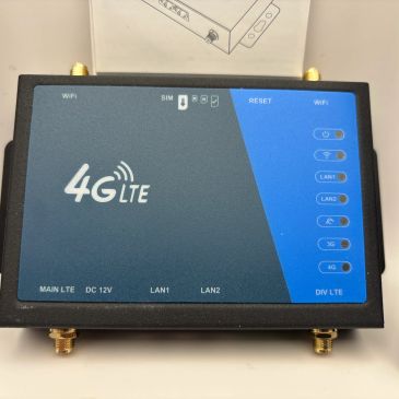 4G LTE router with multiple ports and indicator lights.