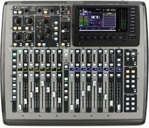 A large mixing board with many buttons and knobs.