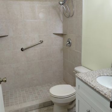 New shower tile with new hardware