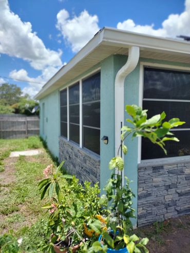 New faux siding and patio windows