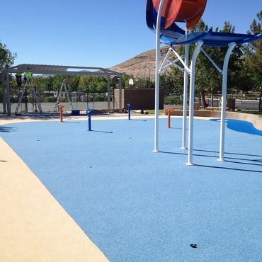 Blue pour in place (PIP) in play area