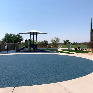 Blue pour-in-place rubber in play area