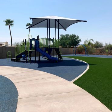 Blue pour-in-place (PIP) rubber with turf and side walk design