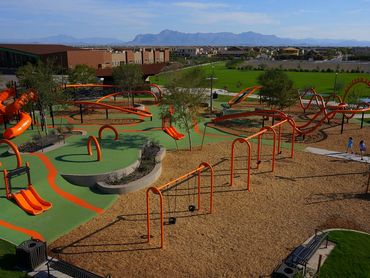 Orange Monster swing sets and ropes course