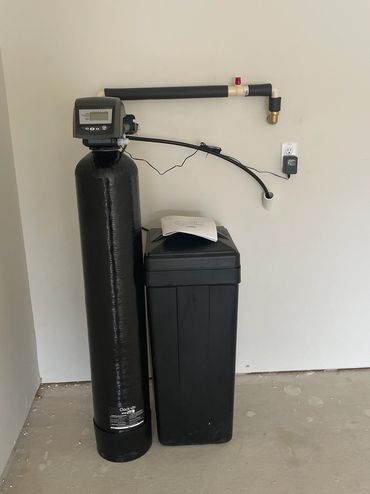 A water softener system installed