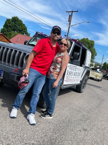John with wife, Mindy, waiting to walk in Plains Day parade 6/7/25