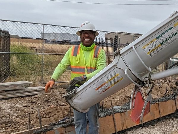 Employee smiling on jobsite