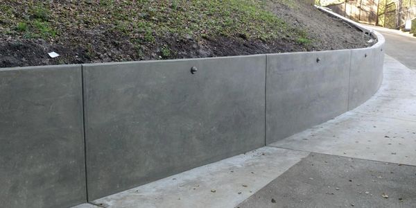 Concrete retaining wall.