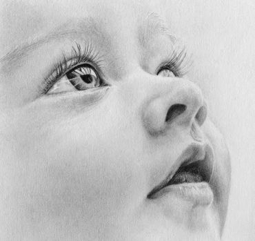 Pencil memorial portrait of LJ as a baby looking upward.
