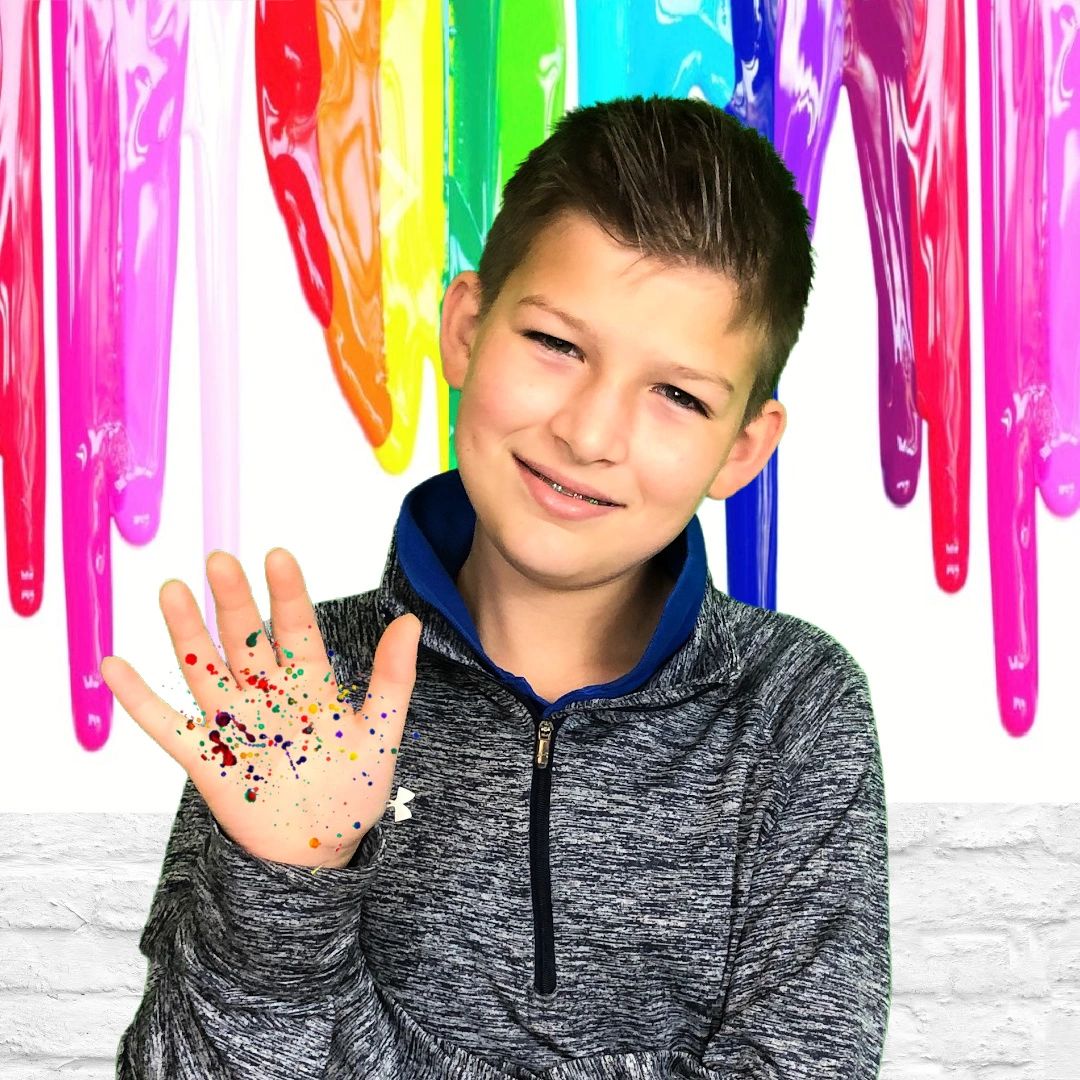 Boy with paint on his hands