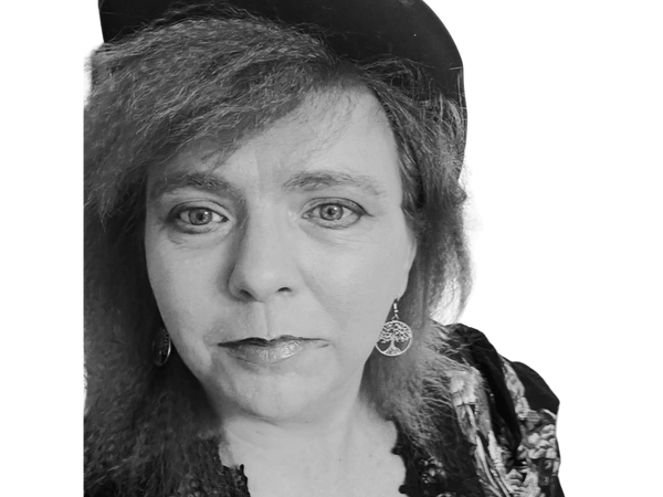 Black and white close-up portrait of Melody circa 2024