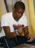 Joseph getting his tattoo equipment ready for a client. (See Shane's Tattoos on Facebook and Instagr
