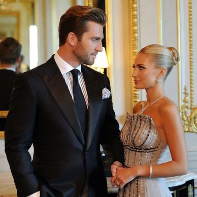 A visually appealing couple, engrossed in an intense gaze, exuding an aura of love and admiration.