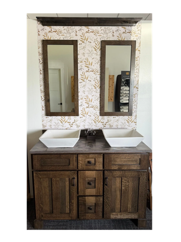 Rustic bathroom vanity with dual sinks and mirrors.
