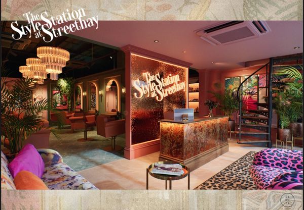 Stylish and vibrant salon interior with bold patterns and chic decor.