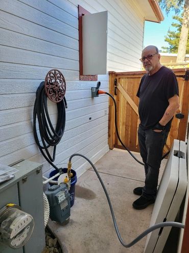 Transfer switch fed by the gas line with generator in shed