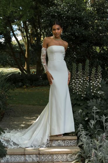 white satin bridal dress with lace sleeves