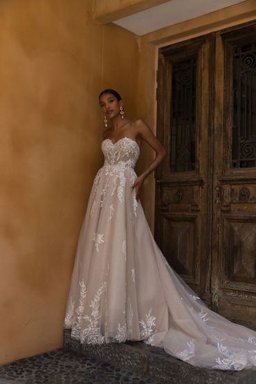 nude strapless dress with lace and tulle