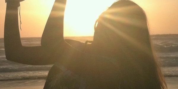 A person making a hand heart