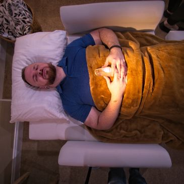 A patient in a QHHT Hypnosis Session