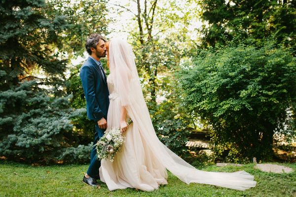 Bride and Groom on their wedding day before using our flower preservation service.