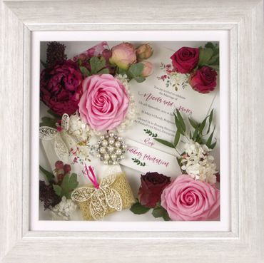 Freeze dried flowers and items from wedding. Created by The Flower Preservation Studio.