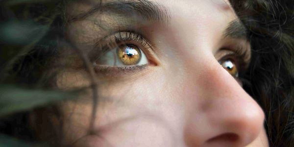 woman looking up closeup