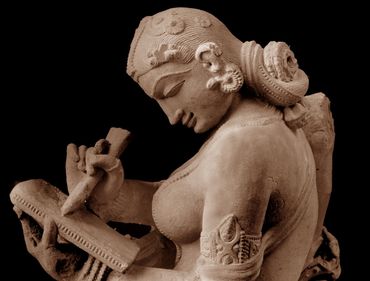 Women writing a letter - 10th century, Kandariya Mahadeva temple- built by King  Vidyadhara between