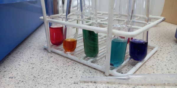 Test tubes with different coloured liquids