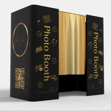 Elegant black and gold photo booth with a curtain entrance.