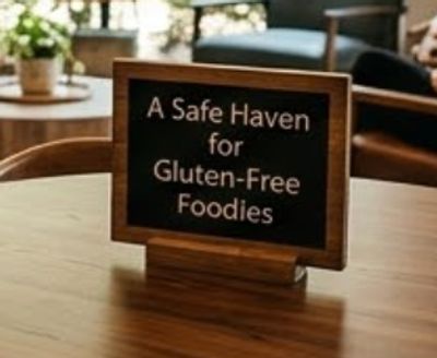 Sign on table reads 'A Safe Haven for Gluten-Free Foodies'.