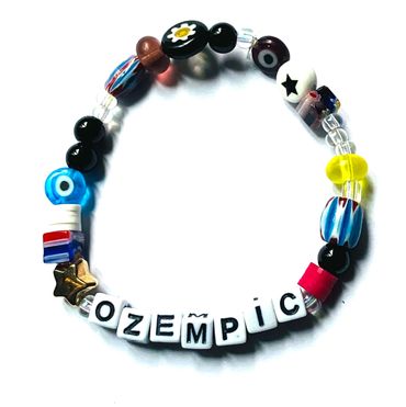 Tongue and cheek bracelet with message