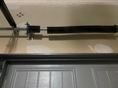 a broken garage door spring