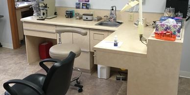 patient desk and chair, cream desk and black chair
