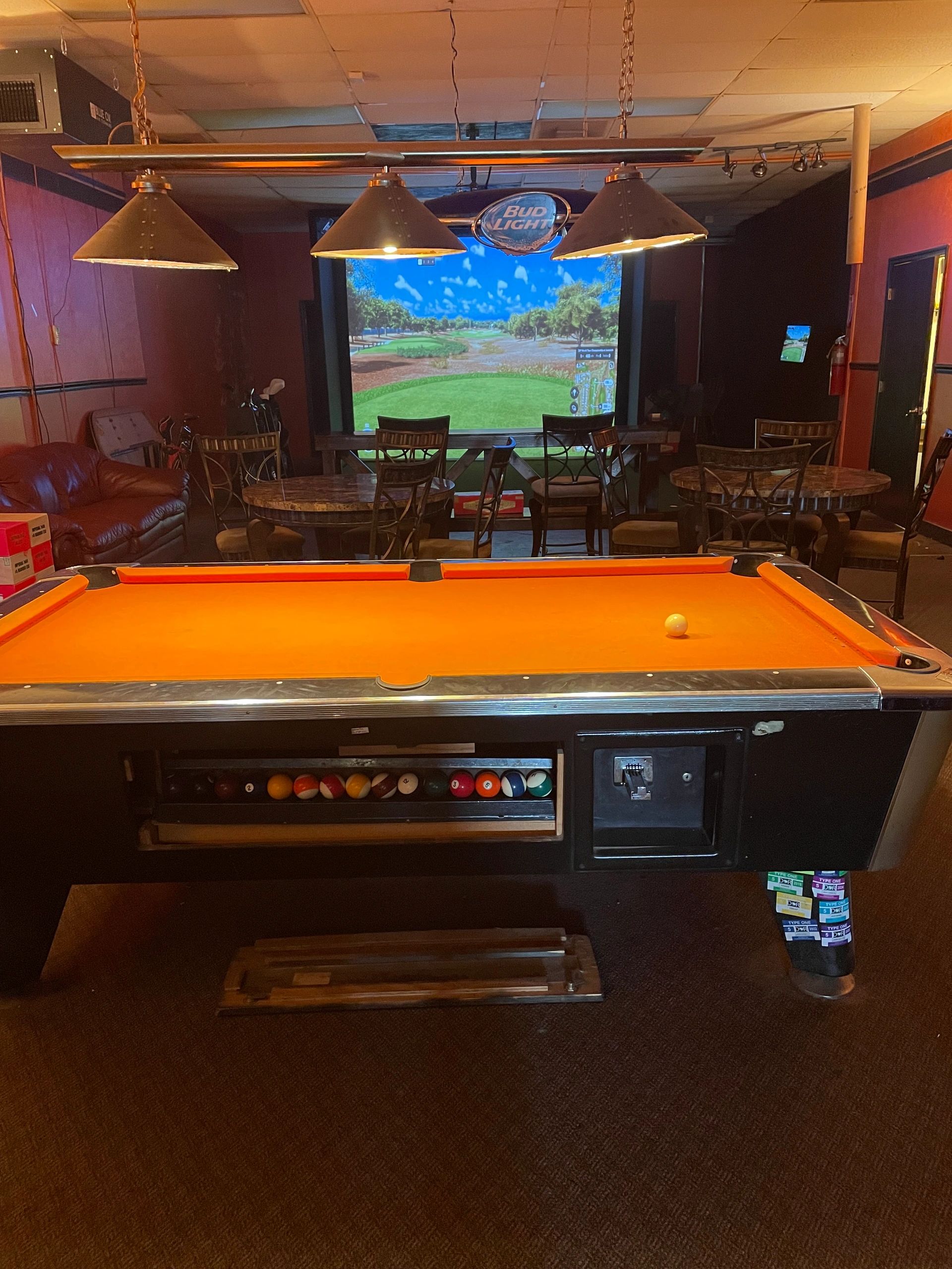 Indoor golf and billiards at Bucksnort's