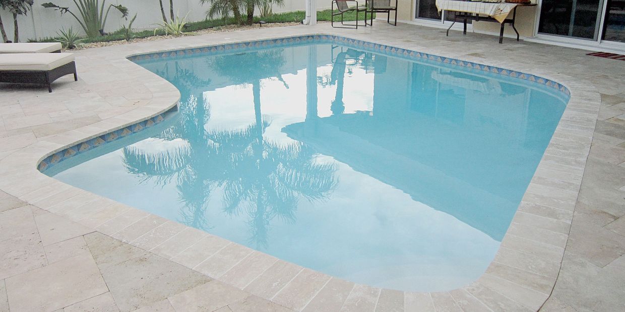 Pool Remodeling. Pool resurface, pool retile, new travertine pool deck