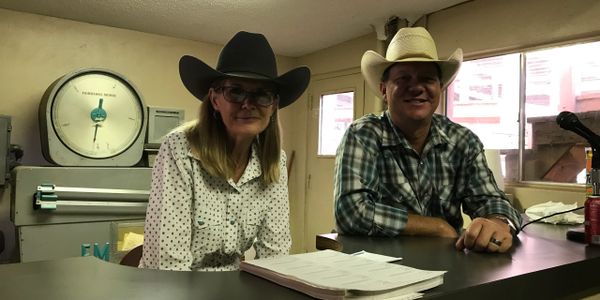 Round Mountain Horse & Tack Auction (RMHTA) Block Clerk, Trish Knawpp pictured with Cass Ringelstein