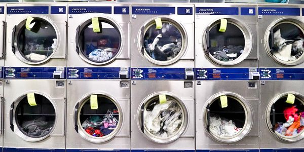 front view of multiple washing machines