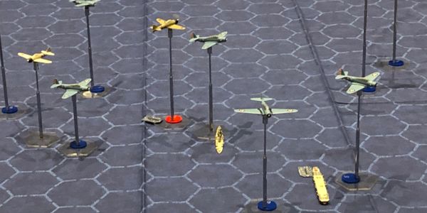 American and Japanese aircraft over a Japanese fleet.