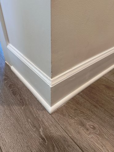 Corner Wall and Baseboard restoration