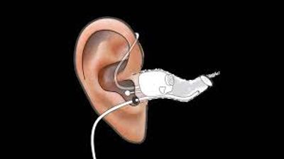 Probe tube and hearing aid in ear canal; real ear verification