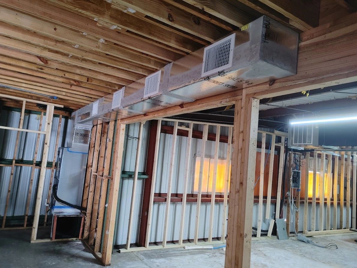 New AC ducts being installed.