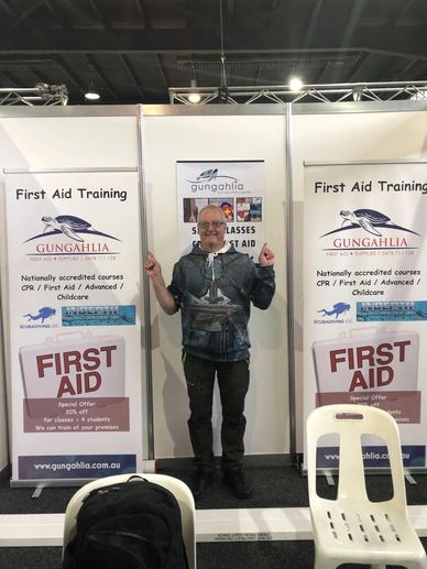 Peter at stand promoting gungahlia first aid business