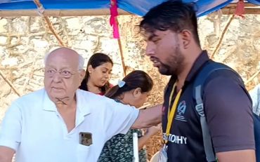 🙏💖 ..elderly volunteer assisting a blind participant to navigate through the crowd at the HBWF event!